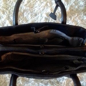 It's an hand bag purse christian siriano